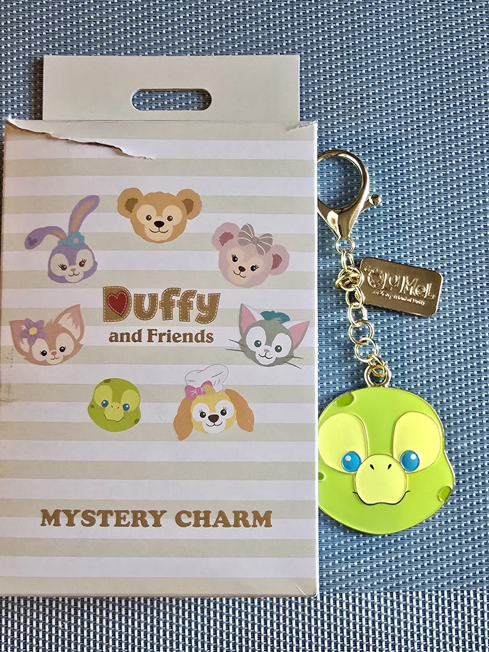 D23 Exclusive, Olu Mel, Duffy & Friends Mystery Charm